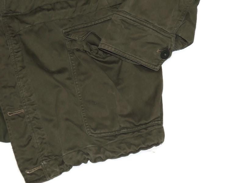 British military combat blouse in olive green/khaki, issued in the 1960s.