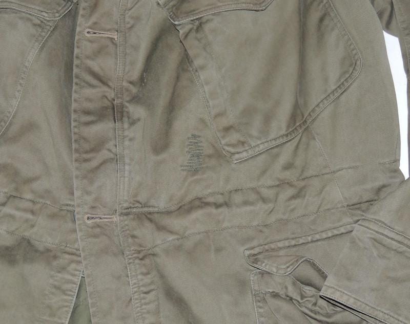 British military combat blouse in olive green/khaki, issued in the 1960s.