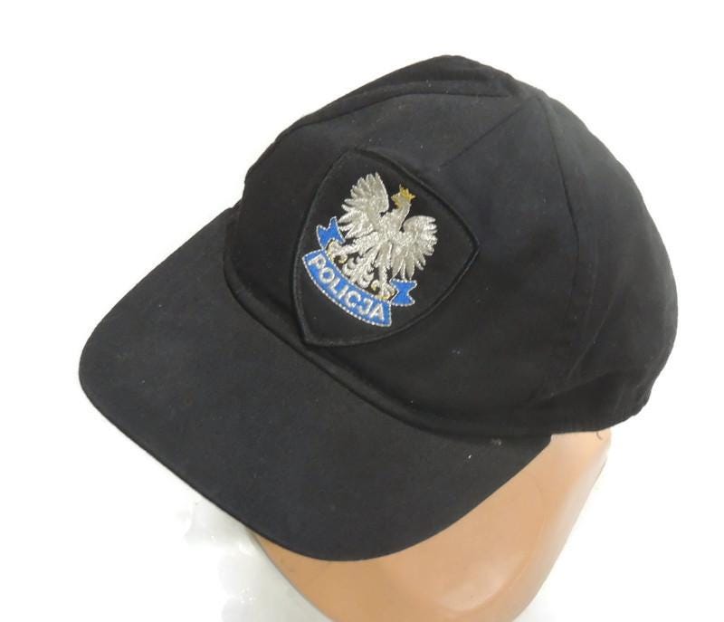 Polish police patrol cap, older design with original badge